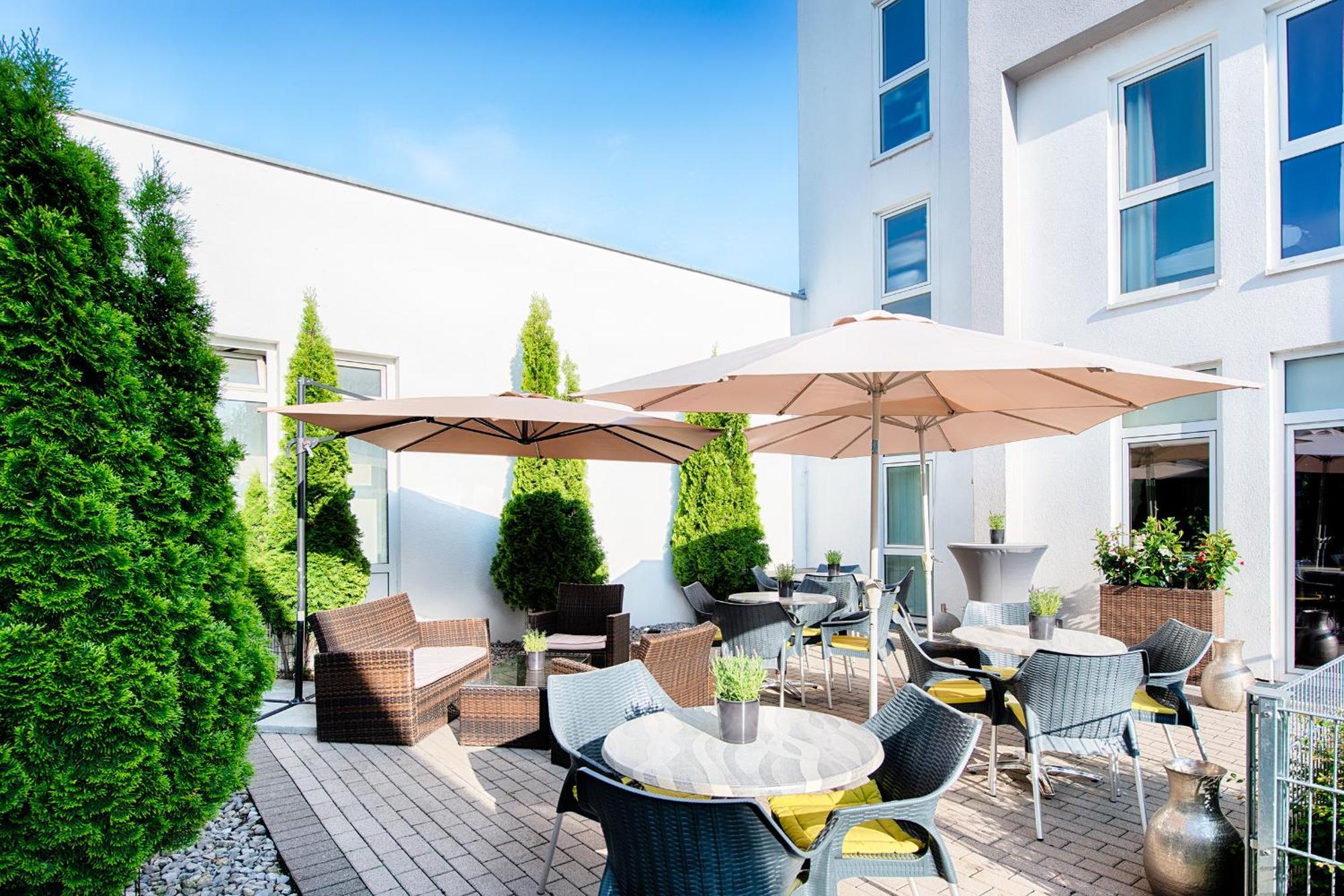 Achat Hotel Хоккенхайм Экстерьер фото